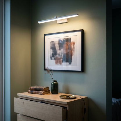 Slim LED Mirror Light 40 cm in matte white used as a picture light above a framed print